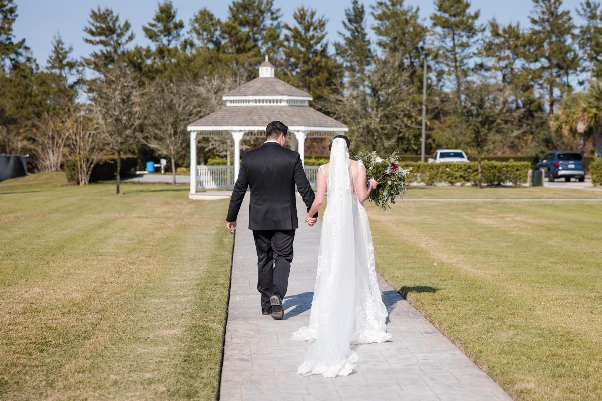Wedding Couple Headed Towards Gazebo