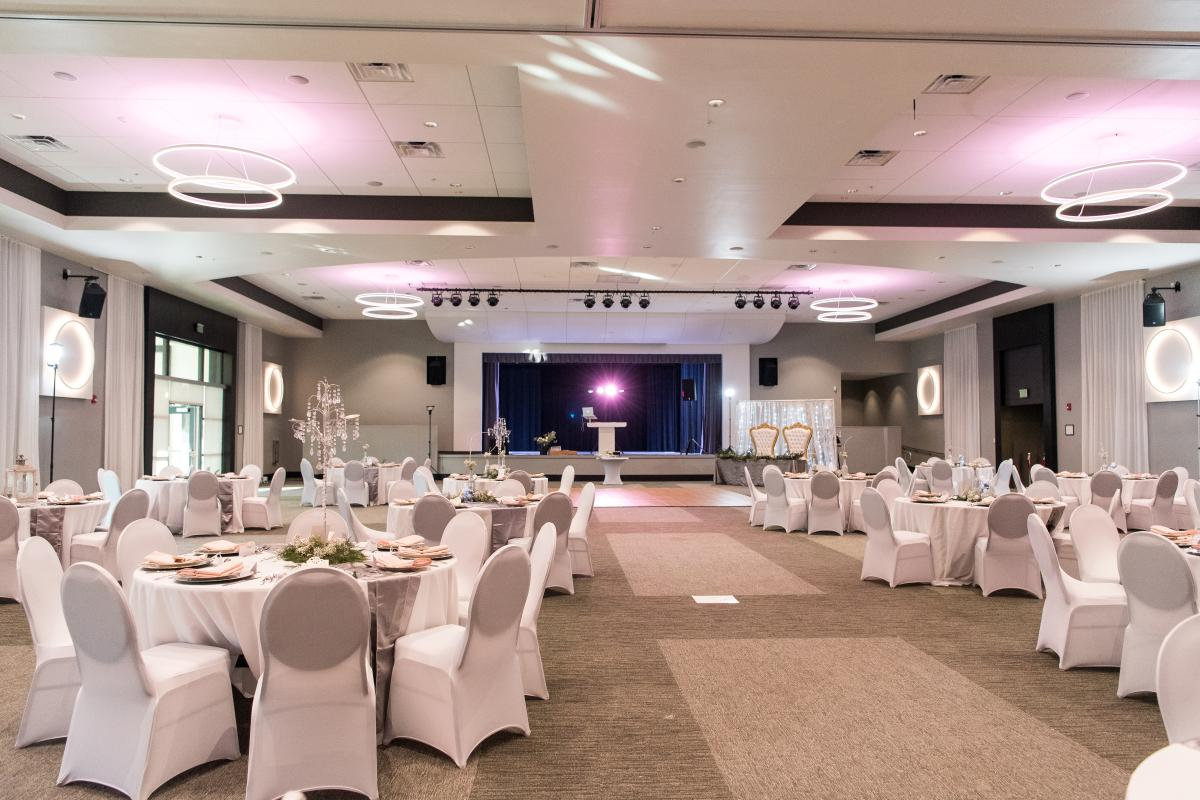 Fully Set up Grand Ballroom with Stage and Tables