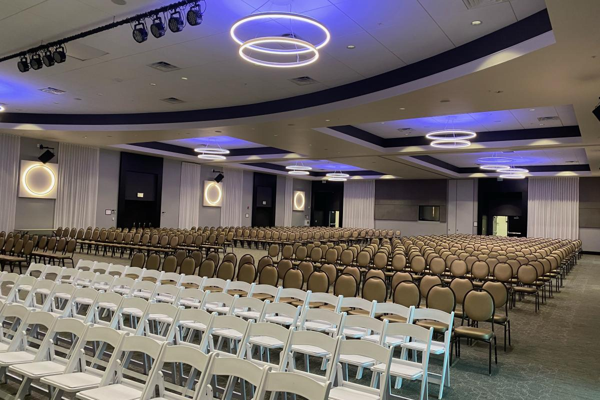 Grand Ballroom Set up with Many Rows of Chairs