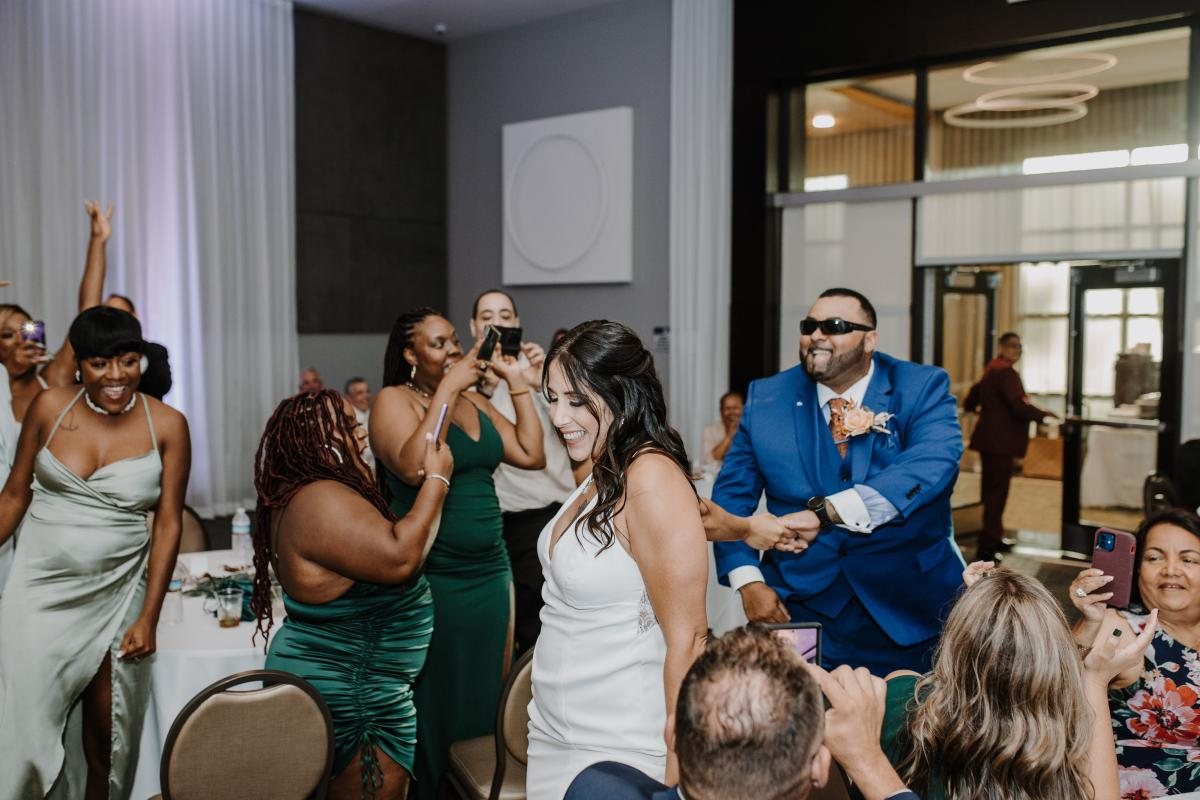 Bride and Groom Entering Reception at Grand Ballroom